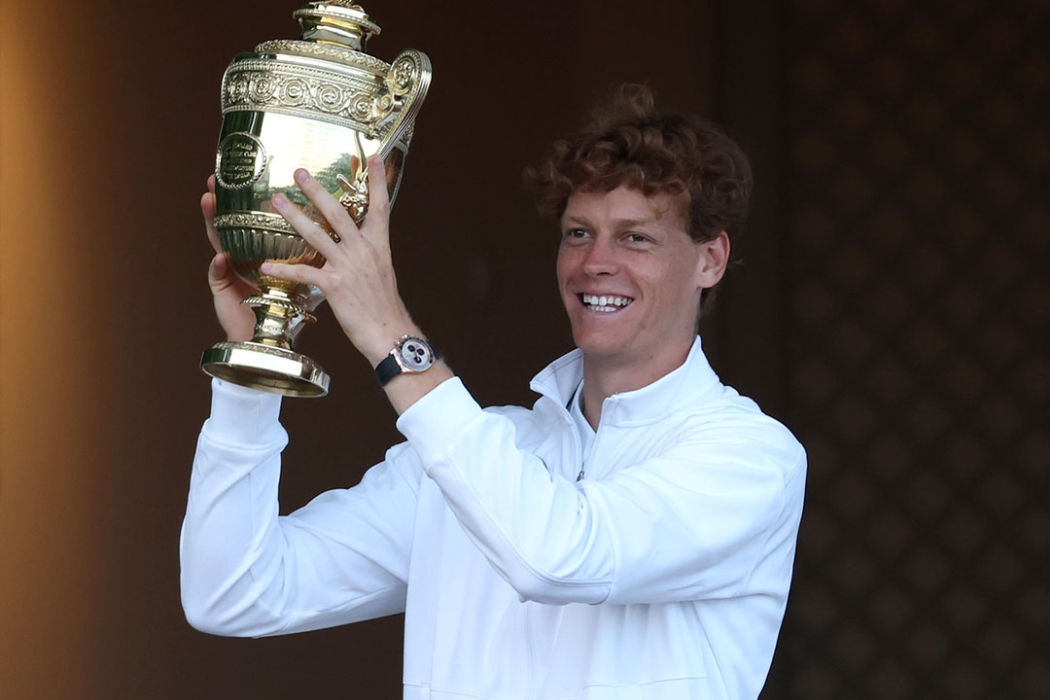 Jannik Sinner celebrates his first Wimbledon title after beating Carlos Alcaraz in the final